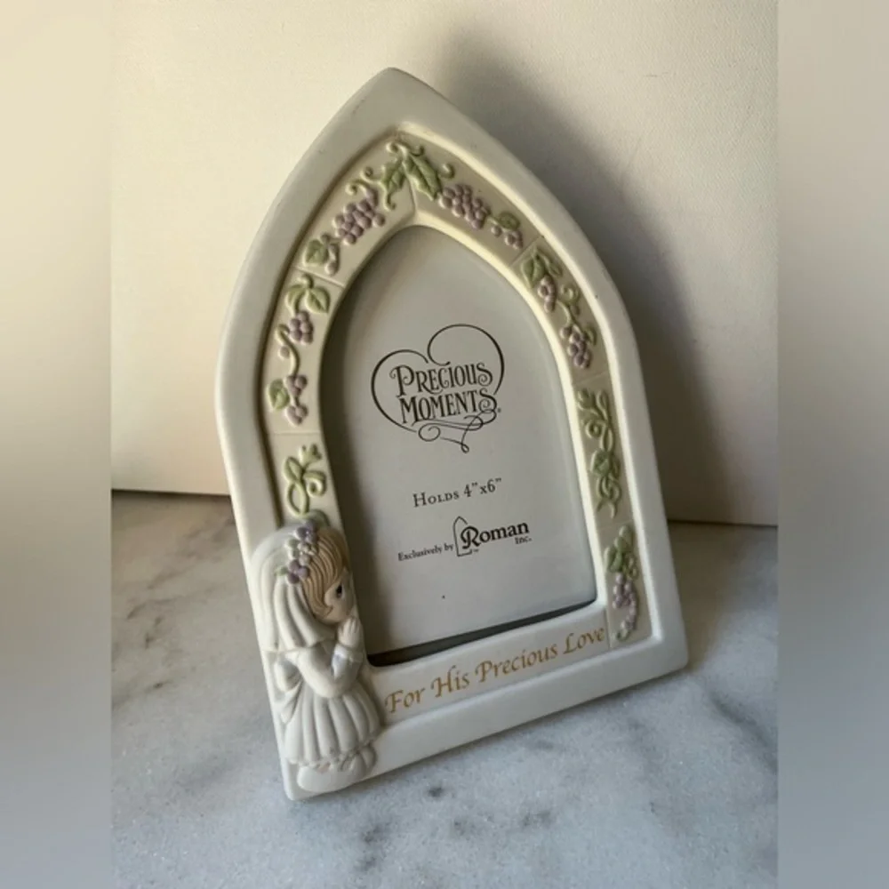 Ceramic precious moments pictures frame holds 4x6”